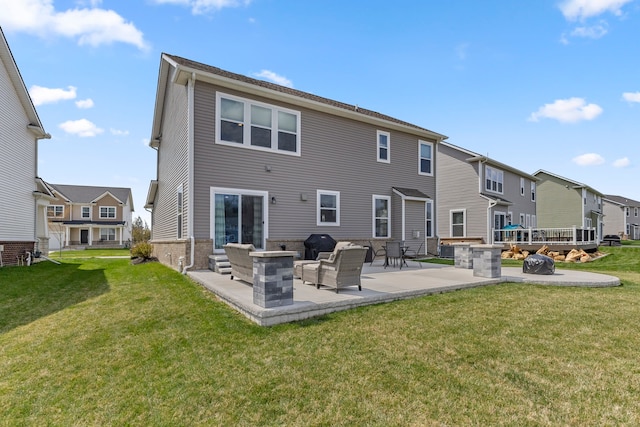 rear view of property with a patio, a yard, and a residential view