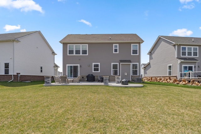 back of property with a patio, a lawn, and cooling unit