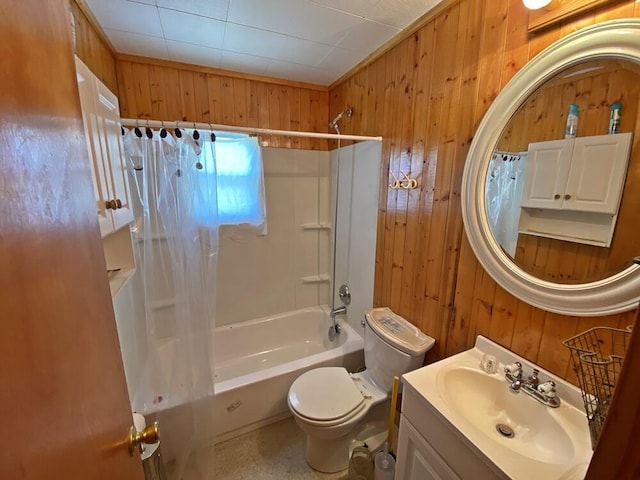 full bathroom with wooden walls, toilet, shower / bathtub combination with curtain, and vanity