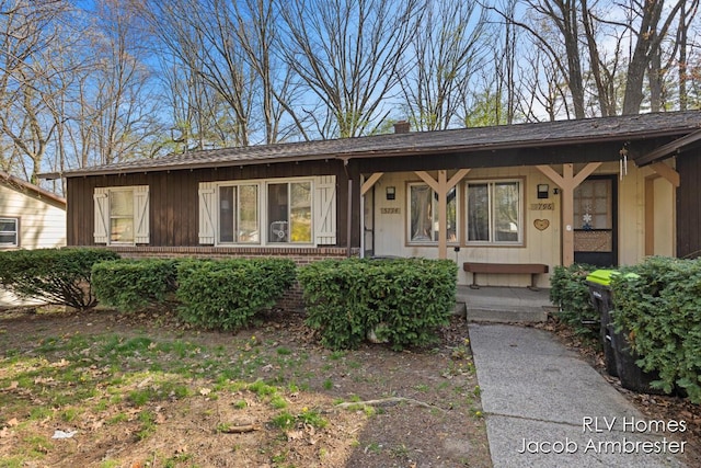 single story home with brick siding
