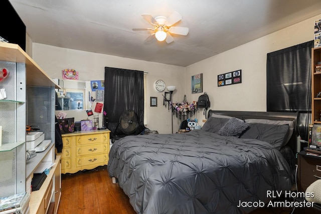 bedroom featuring wood finished floors