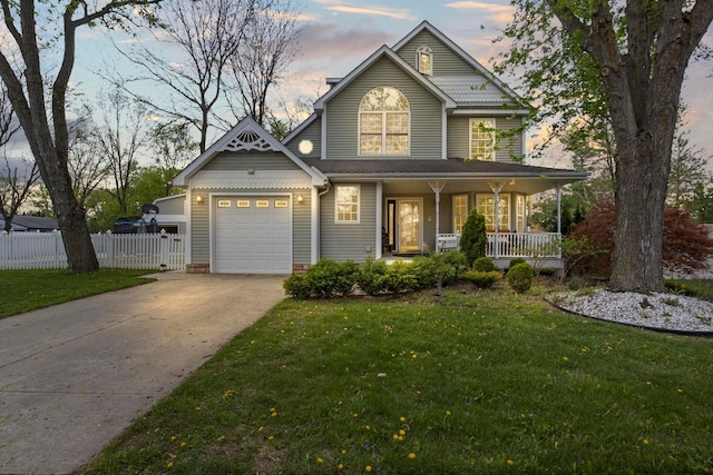 7891 Robindale Ave, Dearborn Heights, MI 48127 - view of front of home with covered porch, an attached garage, and driveway