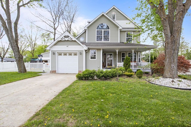 7891 Robindale Ave, Dearborn Heights, MI 48127 - victorian house featuring a porch, a garage, and concrete driveway