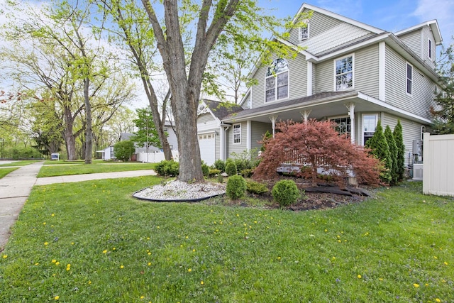 7891 Robindale Ave, Dearborn Heights, MI 48127 - view of front of home featuring a front lawn, a garage, and driveway
