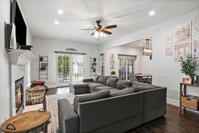 7891 Robindale Ave, Dearborn Heights, MI 48127 - living area with a ceiling fan, dark wood finished floors, a glass covered fireplace, recessed lighting, and baseboards
