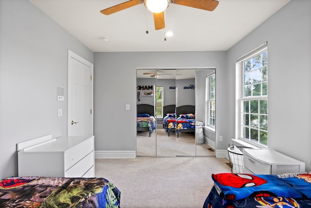 7891 Robindale Ave, Dearborn Heights, MI 48127 - bedroom with a closet, carpet flooring, baseboards, and a ceiling fan