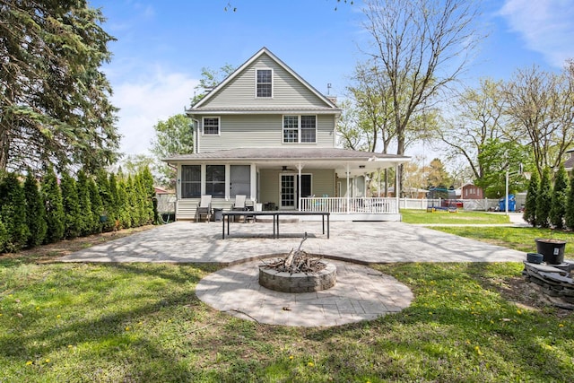 7891 Robindale Ave, Dearborn Heights, MI 48127 - back of property with a patio, an outdoor fire pit, a lawn, and ceiling fan