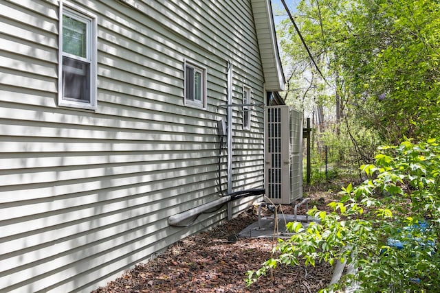 7891 Robindale Ave, Dearborn Heights, MI 48127 - view of home's exterior with central AC unit
