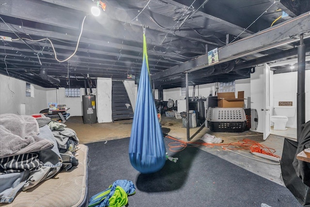 unfinished below grade area with electric water heater