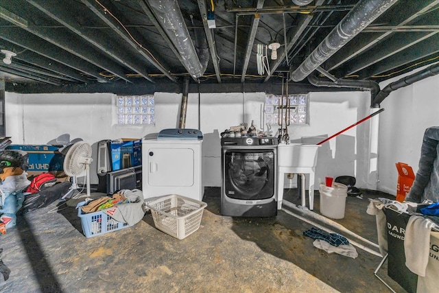 basement with separate washer and dryer and plenty of natural light