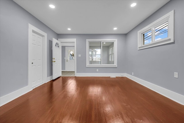 3690 Phillips Ave, Berkley, MI 48072 - unfurnished living room featuring recessed lighting, baseboards, and wood finished floors