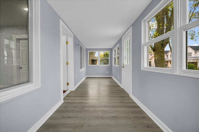 3690 Phillips Ave, Berkley, MI 48072 - hall with baseboards and wood finished floors
