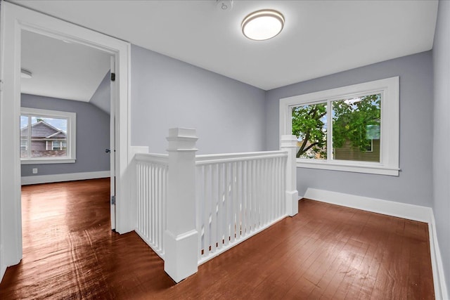 3690 Phillips Ave, Berkley, MI 48072 - hallway with wood-type flooring, baseboards, and an upstairs landing