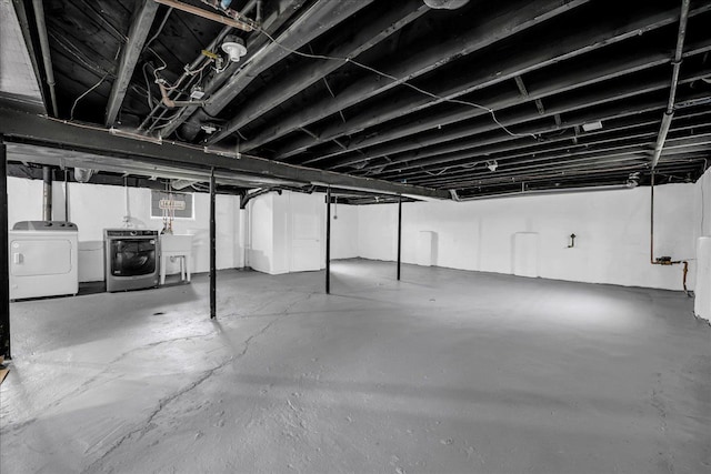 3690 Phillips Ave, Berkley, MI 48072 - unfinished below grade area with separate washer and dryer and a sink