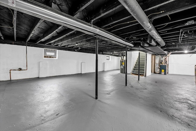 3690 Phillips Ave, Berkley, MI 48072 - basement with heating unit, stairs, and electric water heater