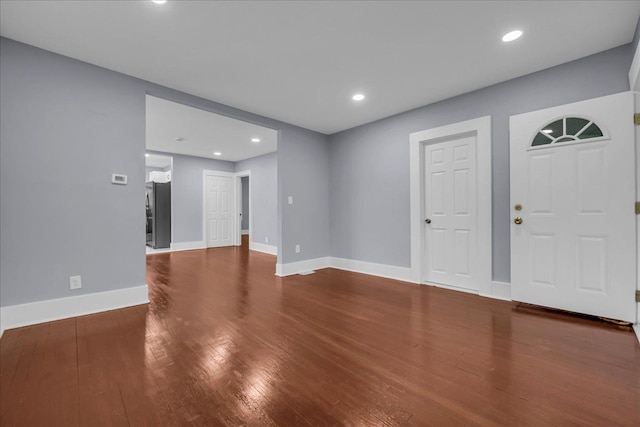 3690 Phillips Ave, Berkley, MI 48072 - unfurnished living room featuring recessed lighting, baseboards, and wood finished floors