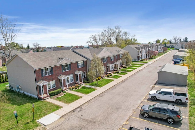 view of street featuring a residential view and entry steps