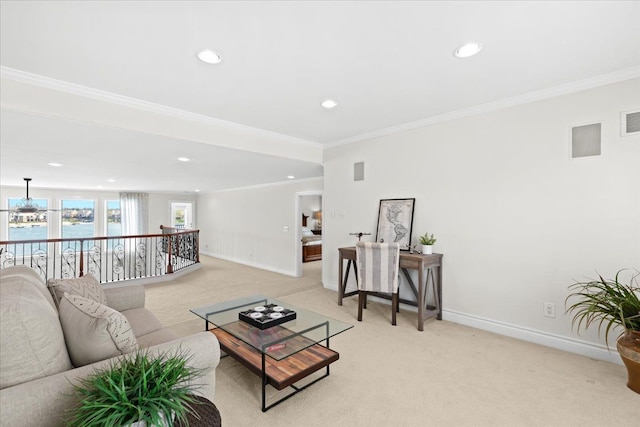 living area featuring ornamental molding, light carpet, baseboards, and recessed lighting