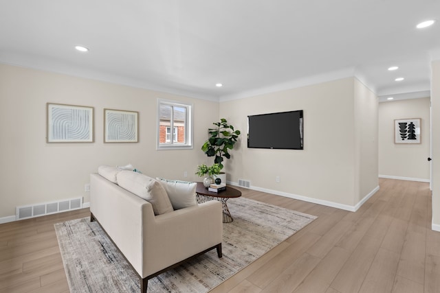 23130 Beverly St, Saint Clair Shores, MI 48082 - living area featuring light wood-style flooring, recessed lighting, and baseboards