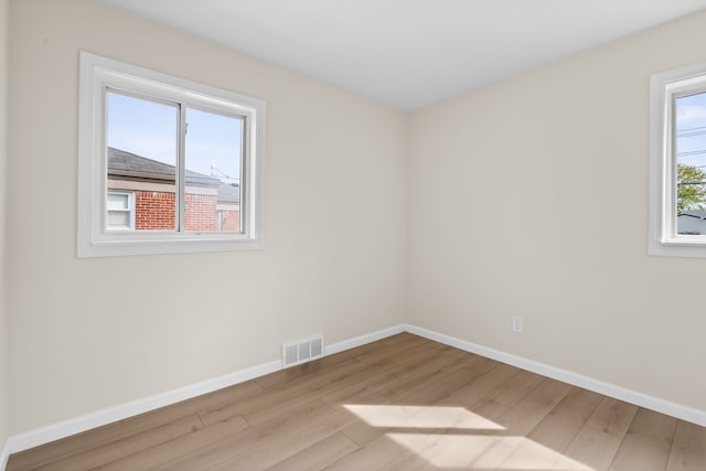 23130 Beverly St, Saint Clair Shores, MI 48082 - empty room featuring light wood finished floors and baseboards