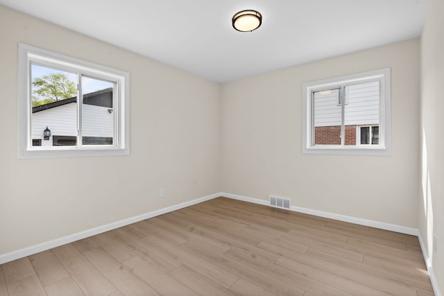 23130 Beverly St, Saint Clair Shores, MI 48082 - empty room featuring light wood finished floors and baseboards