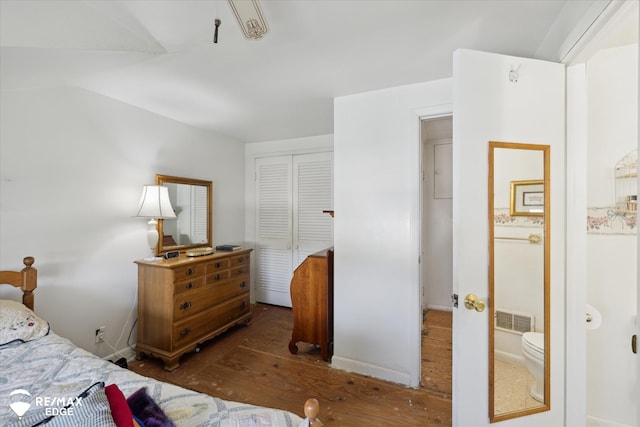 7309 N Genesee Rd, Genesee, MI 48437 - bedroom with a closet, visible vents, and hardwood / wood-style floors