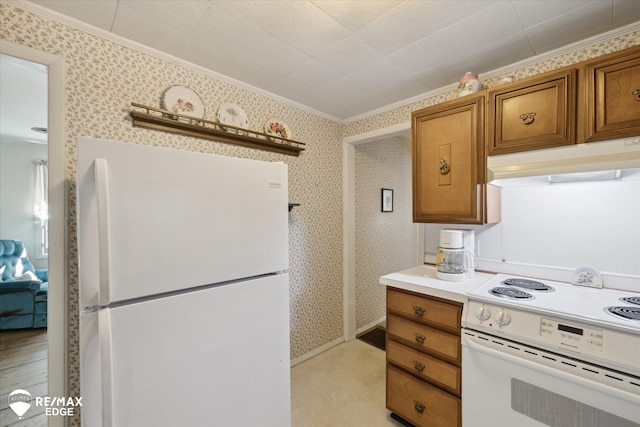 7309 N Genesee Rd, Genesee, MI 48437 - kitchen featuring white appliances, light countertops, brown cabinetry, under cabinet range hood, and ornamental molding