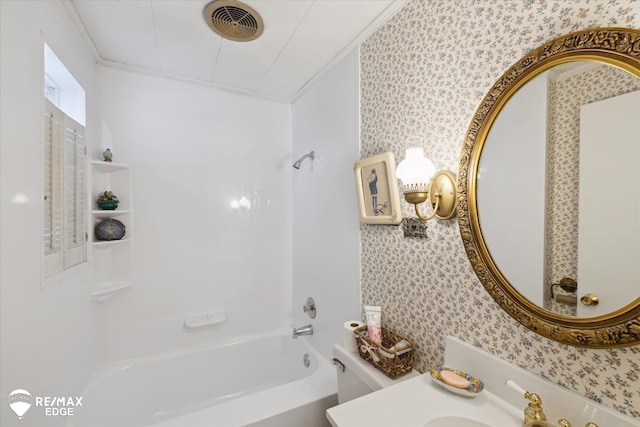 7309 N Genesee Rd, Genesee, MI 48437 - bathroom with crown molding, toilet, wallpapered walls, and shower / washtub combination