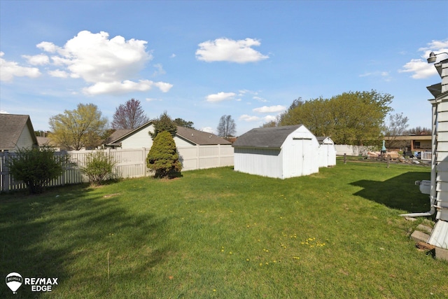 7309 N Genesee Rd, Genesee, MI 48437 - view of yard with an outbuilding, fence, and a storage shed