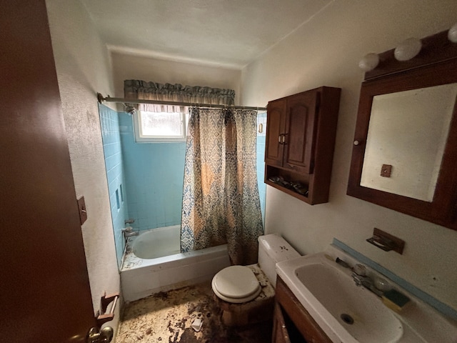 bathroom featuring vanity, shower / bath combination with curtain, and toilet