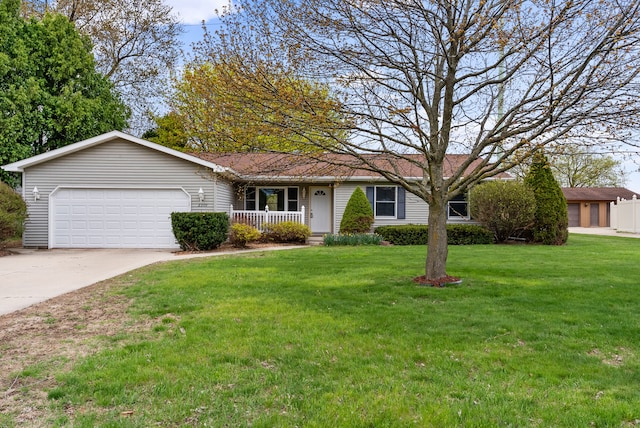 ranch-style house with covered porch, concrete driveway, an attached garage, and a front yard