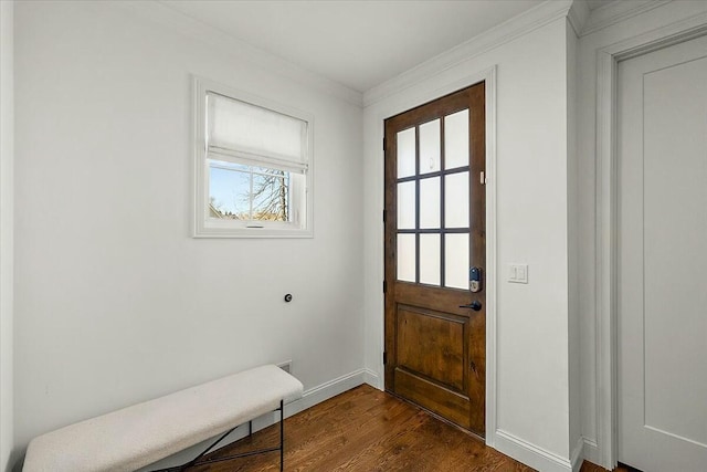 entryway with baseboards, ornamental molding, and dark wood-style floors