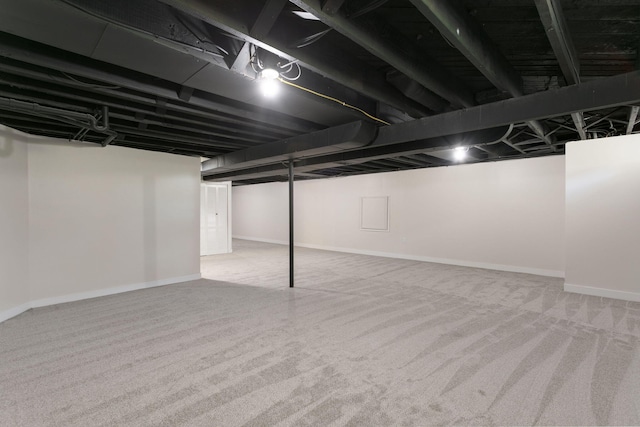 finished below grade area with carpet floors and baseboards