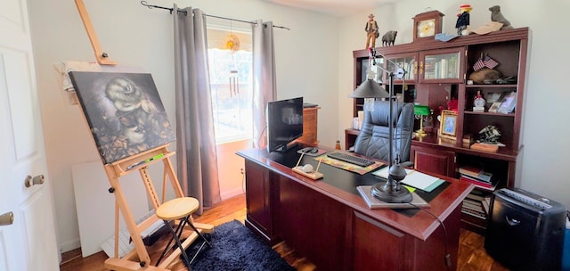 office area with wood finished floors