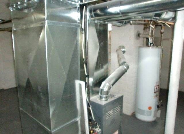 19724 Elkhart St, Harper Woods, MI 48225 - utilities featuring heating unit and water heater