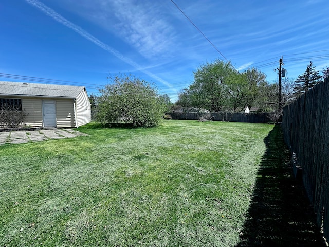 view of yard featuring a fenced backyard