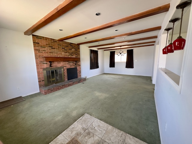unfurnished living room with carpet, a brick fireplace, recessed lighting, and beam ceiling