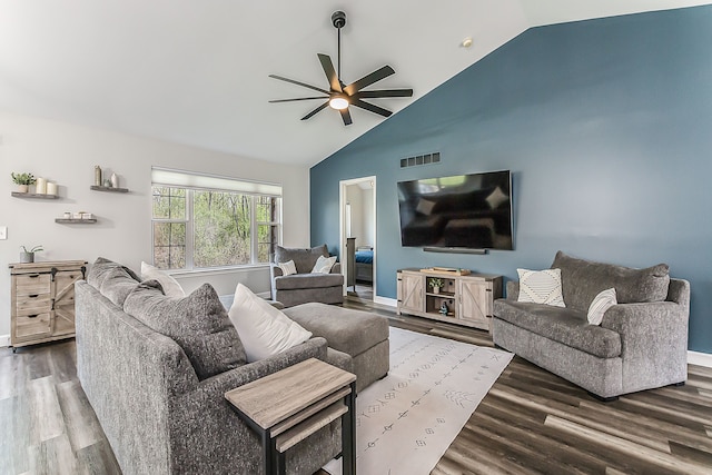 living area featuring high vaulted ceiling, a ceiling fan, baseboards, wood finished floors, and visible vents