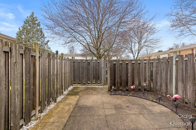 2464 Abbington Dr SE, Grand Rapids, MI 49506 - view of patio featuring fence