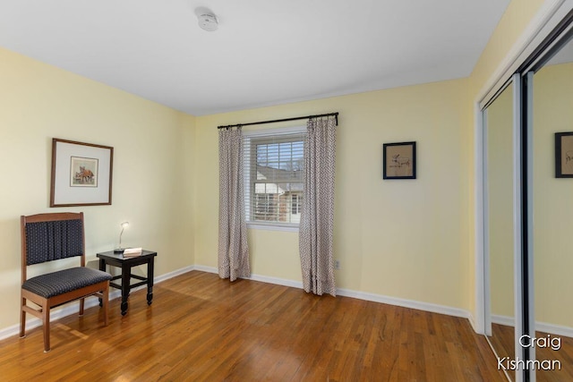 2464 Abbington Dr SE, Grand Rapids, MI 49506 - sitting room featuring baseboards and wood finished floors