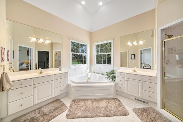 bathroom featuring a notable chandelier, visible vents, a shower stall, and a sink