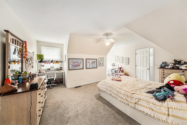 bedroom featuring ceiling fan, visible vents, vaulted ceiling, baseboards, and carpet
