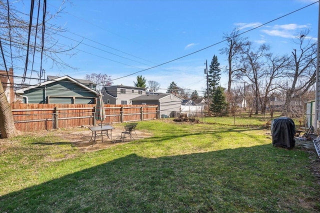 view of yard with a fenced backyard and a patio