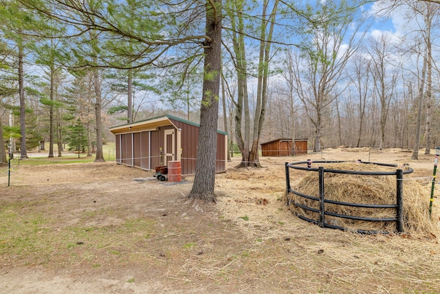 4824 Little Cedar Creek Dr, Attica, MI 48412 - view of yard featuring a pole building, an outdoor structure, and fence