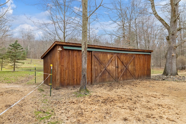 4824 Little Cedar Creek Dr, Attica, MI 48412 - view of outdoor structure featuring an outbuilding and fence