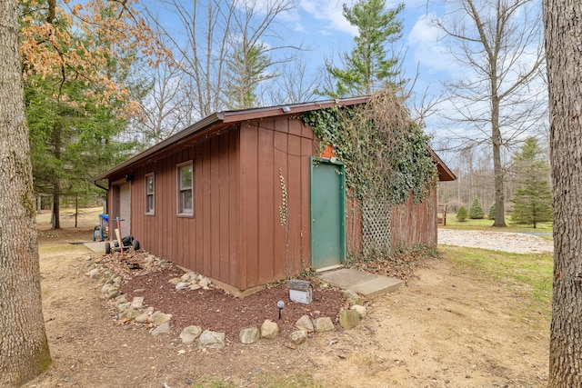 4824 Little Cedar Creek Dr, Attica, MI 48412 - view of side of home featuring an outbuilding