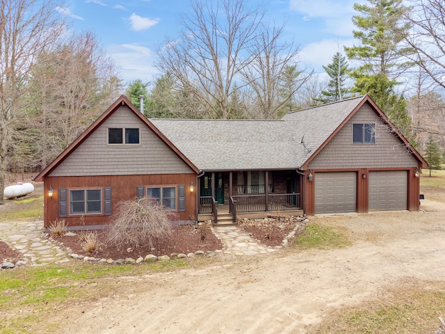 4824 Little Cedar Creek Dr, Attica, MI 48412 - view of front of property with a porch, driveway, and roof with shingles