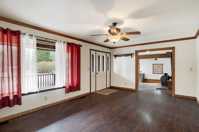 4824 Little Cedar Creek Dr, Attica, MI 48412 - unfurnished room featuring a ceiling fan, wood finished floors, baseboards, and ornamental molding