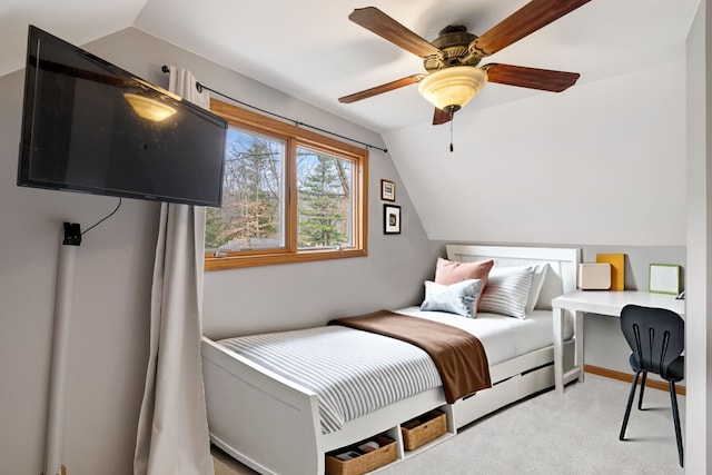 4824 Little Cedar Creek Dr, Attica, MI 48412 - bedroom with vaulted ceiling, light carpet, a ceiling fan, and a desk