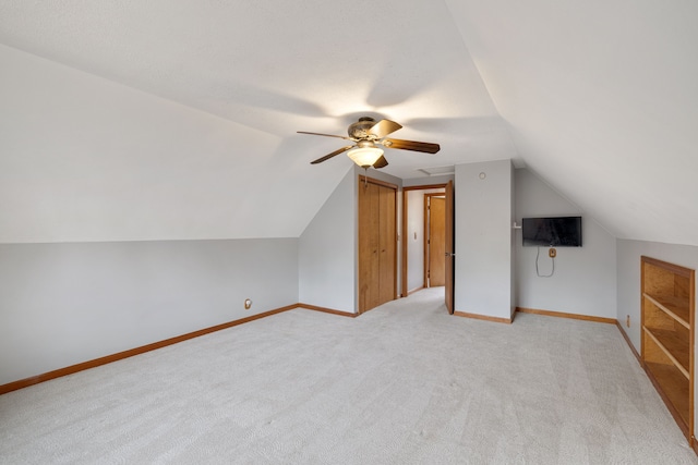 4824 Little Cedar Creek Dr, Attica, MI 48412 - bonus room with lofted ceiling, light colored carpet, a ceiling fan, and baseboards